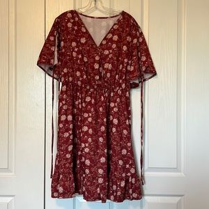 Dark red summer dress with ties on each arm. Light material and never worn